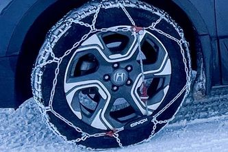 Which Tires to Put Chains on AWD: Essential Guide for Safe Winter Driving