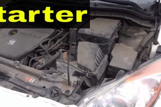 WHERE IS THE STARTER LOCATED IN A CAR?