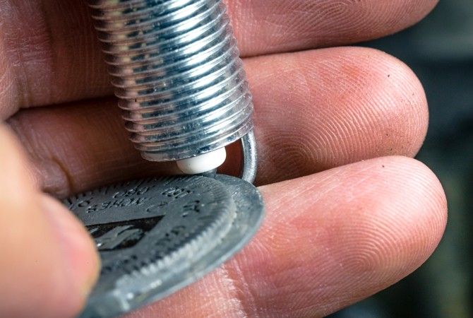How to Gap Spark Plugs Without a Tool?